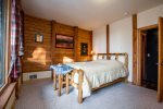 Rustic log furniture for that elegant log cabin feel in second Queen Bedroom